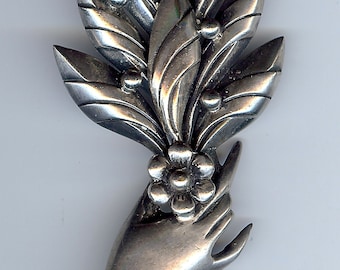 VINTAGE 1930'S STERLING SILVER hand holding large dimensional plant brooch pin