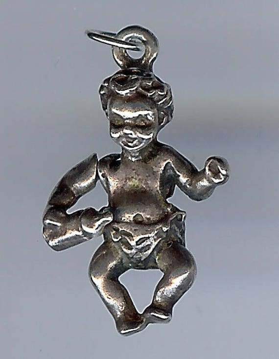VINTAGE STERLING SILVER 3D movable baby with bottl