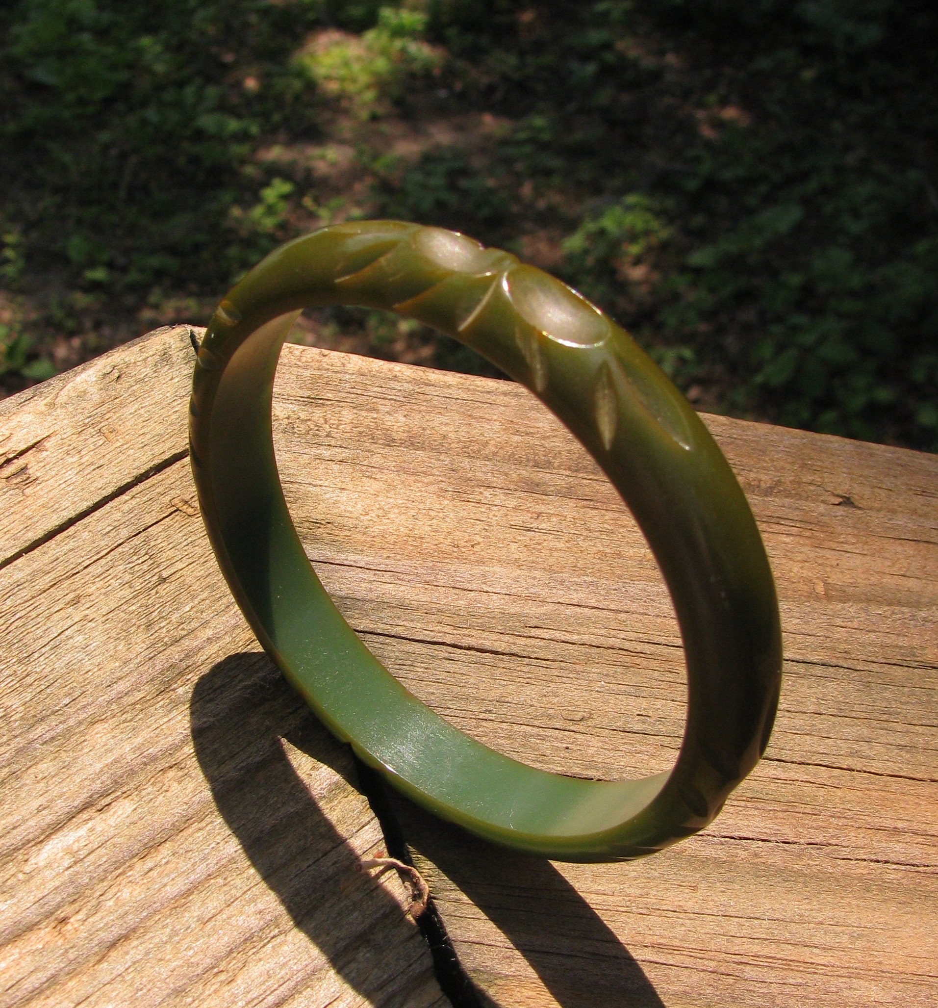 Lot - Vintage 1950s Charles Frederick Worth enameled metal and bakelite  bracelet; blackamoor native tribal African figures playing drums.