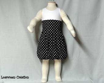 Robe boule noir à pois blanc, jusqu'au 4 ans.