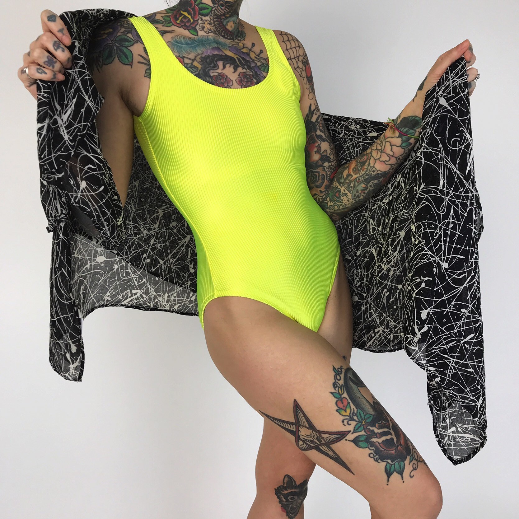 neon yellow long sleeve bodysuit