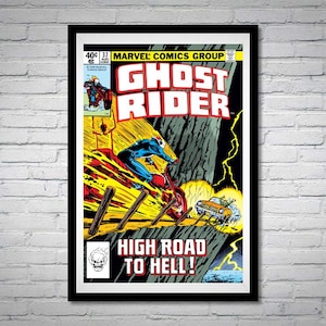 May include: Framed comic book cover featuring Ghost Rider. The artwork depicts a figure on a motorcycle engulfed in flames, with the text "Ghost Rider" in bold red letters. The phrase "High Road to Hell!" is also visible.