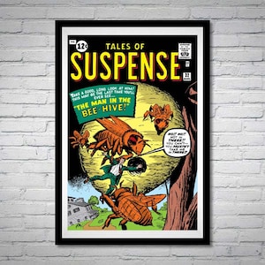 May include: Framed vintage comic book cover titled "Tales of Suspense" featuring a dramatic scene with giant bees attacking a man. The artwork is in vibrant colors, with bold text and speech bubbles.