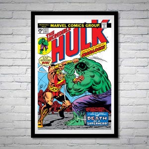 May include: Framed comic book cover featuring The Incredible Hulk battling a foe. The Hulk is green, wearing purple pants, and the opponent is in red and gold. Text includes "The Incredible Hulk" and "Death of a Superhero!"