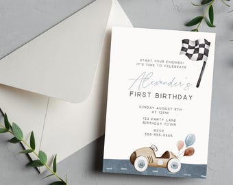 May include: A white invitation card with blue and gray accents. The card features a cartoon illustration of a vintage race car with balloons. The text on the card reads "Start your engines! It's time to celebrate Alexander's First Birthday. Sunday August 8th at 12pm. 123 Party Lane Birthday Town. RSVP 555-555-5555."