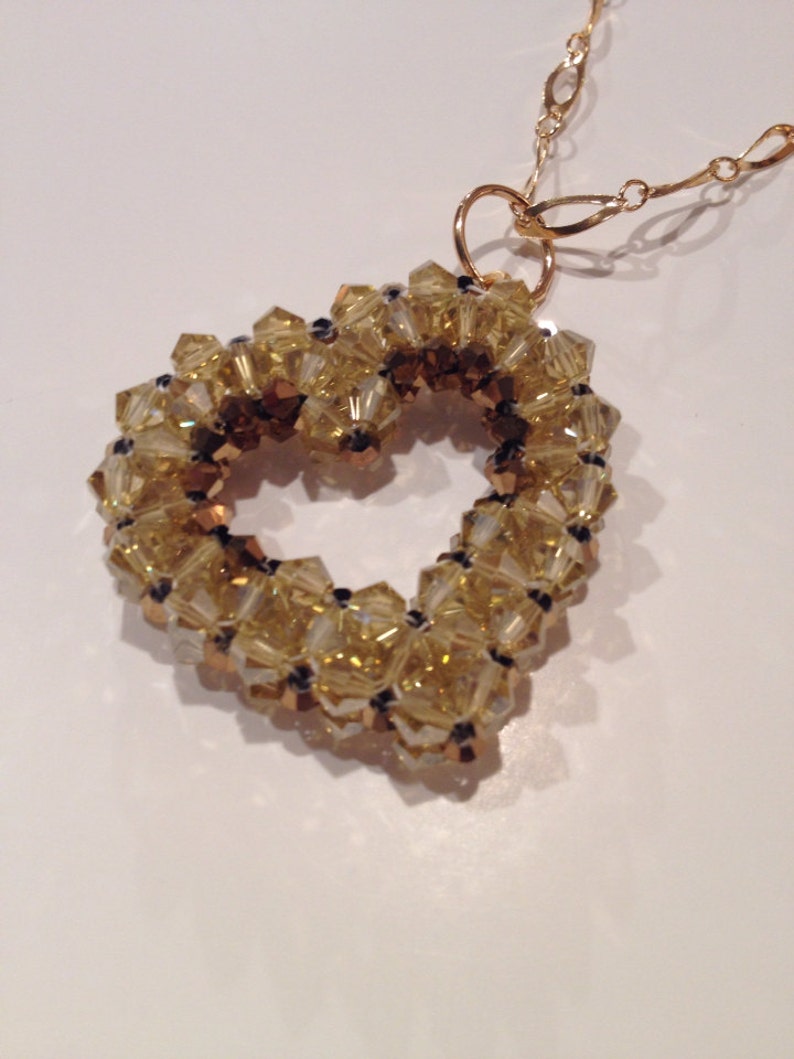 Crystal Heart Pendant Floating Necklace Beaded Image 0