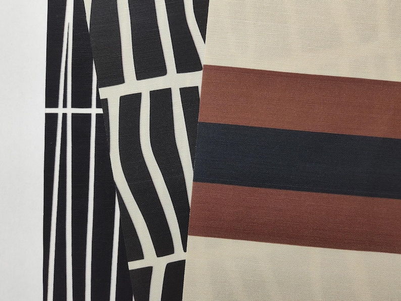 May include: Two distinct fabric swatches are displayed side by side. The left swatch features a black and white abstract pattern of vertical, slightly curved lines. The right swatch displays horizontal stripes in alternating bands of beige, brown, and black.
