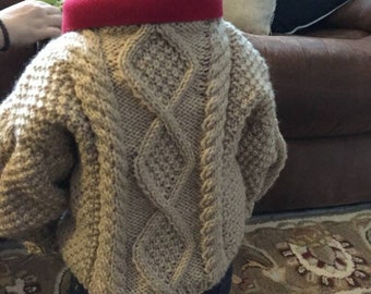 Hand crafted baby aran sweater