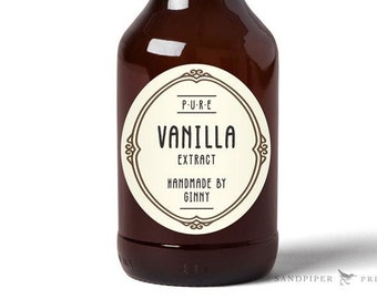 May include: A glass bottle with a brown liquid inside and a label that reads "PURE VANILLA EXTRACT HANDMADE BY GINNY".