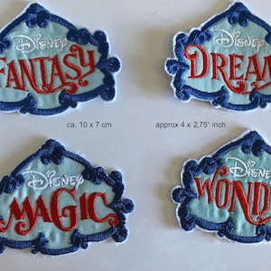 May include: Four embroidered iron-on patches with a blue and white background and red lettering. The patches feature the words "Disney Fantasy", "Disney Dream", "Disney Magic", and "Disney Wonder".