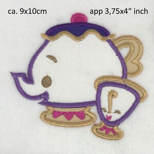May include: Embroidered iron-on patch featuring a purple and gold teapot with a pink lid and a purple and gold teacup. The patch measures approximately 3.75 inches by 4 inches.