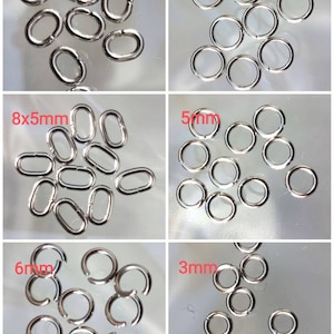 Pack of 100 round or oval stainless steel rings