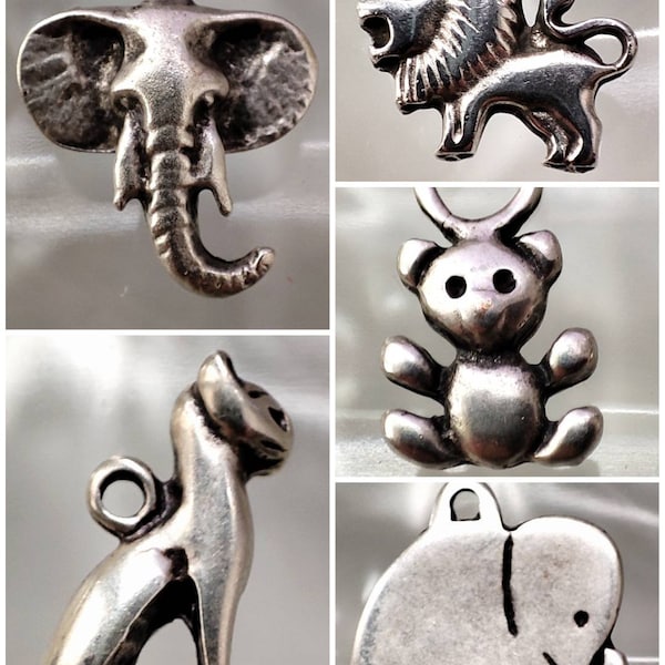 Pendentifs animaux argentés : coccinelle, tête éléphant, éléphant,hérisson strass,ourson, tortue terre, tortue d'eau, lion,chat égyptien.