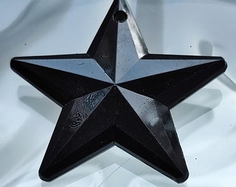 Large faceted black plastic star pendant