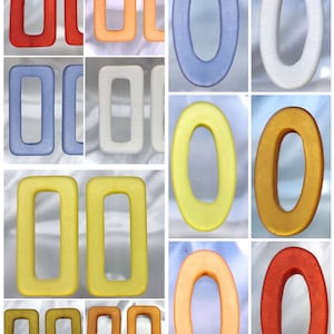 Set of 2 hollowed-out rectangles or ovals in polaris resin, choice between 5 or 6 colors. Beads pierced in height
