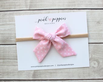 Pink Polka Dot Baby Bow  -  Soft Nylon Headband -  Fits Newborns, Babies, and Toddlers