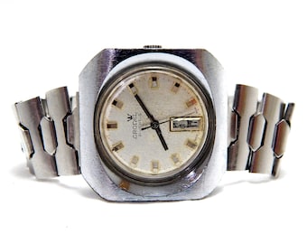 Vintageklocka, CRONEL-klocka, klockmekaniker, 21 juveler, armbandsur, cirka 1960, 39 mm, stålboett, unisexklocka, fungerar ej, behöver renoveras