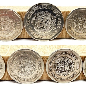 Puede incluir: Seis monedas de plata del Banco Central de Reserva del Perú. Las monedas muestran el escudo de armas del Perú y los años 1999, 2000, 2005, 2006, 2019 y 2021.