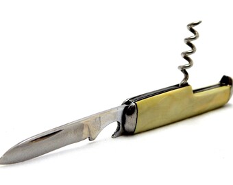 May include: A yellow handled pocket knife with a corkscrew, bottle opener, and blade.