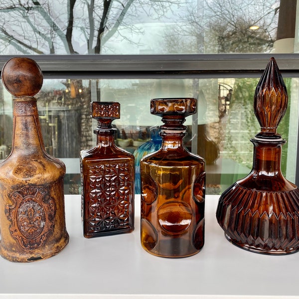 Choice of Vintage Amber Glass and Leather Wrapped Fleur de Lis Decanters