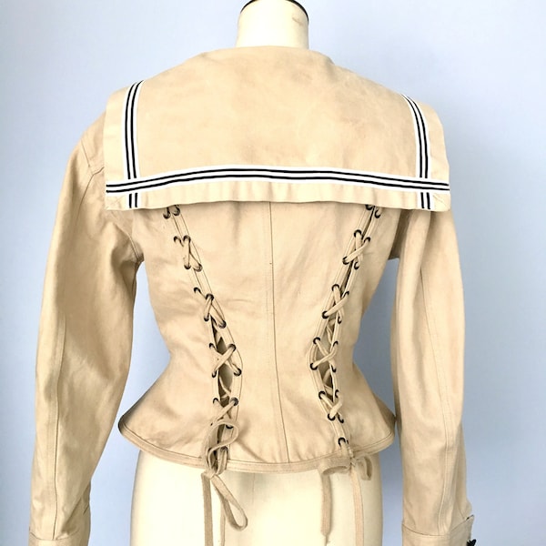 Jean Paul Gaultier laced jacket Junior Gaultier wasp waist sailor jacket 80s Jean Paul Gaultier fitted jacket with lacing sailor stripes