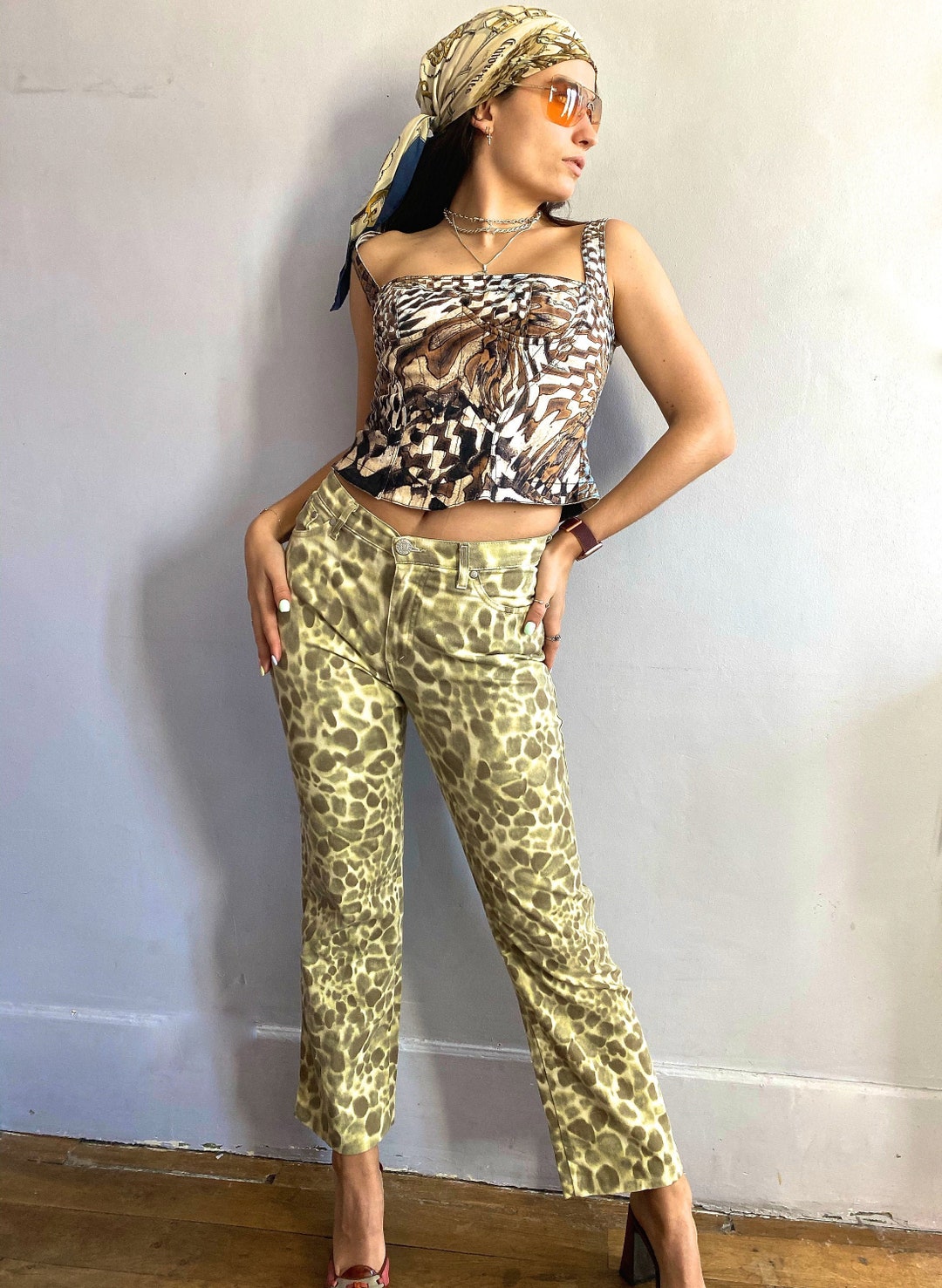 パンツ Roberto Cavalli MORAY EEL PRINT PANTS (QKT210_SZF4905558) Roberto Cavalli Moray Eel Print Pants | italist