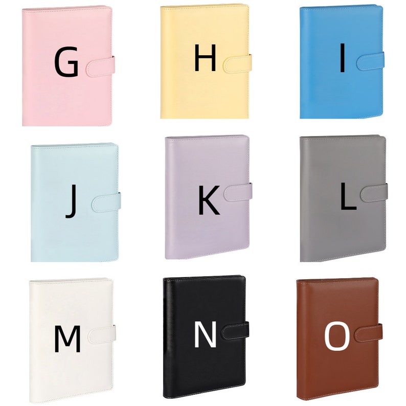 May include: Nine different colored binders with letters G through O on the front. The binders are all the same size and shape, and they have a flap on the front that can be closed with a button.