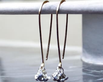 Gold filled and sterling silver long,  hand forged earrings.