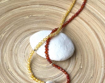 Crystal beaded necklace with freshwater pearl.