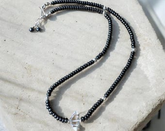 Beaded necklace with Hematite and Herkimer diamond