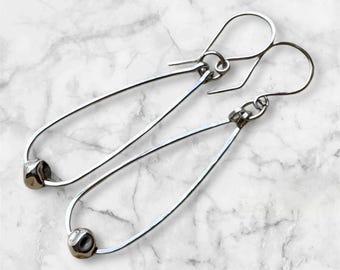 Sterling silver teardrop hoop earrings with silver beads