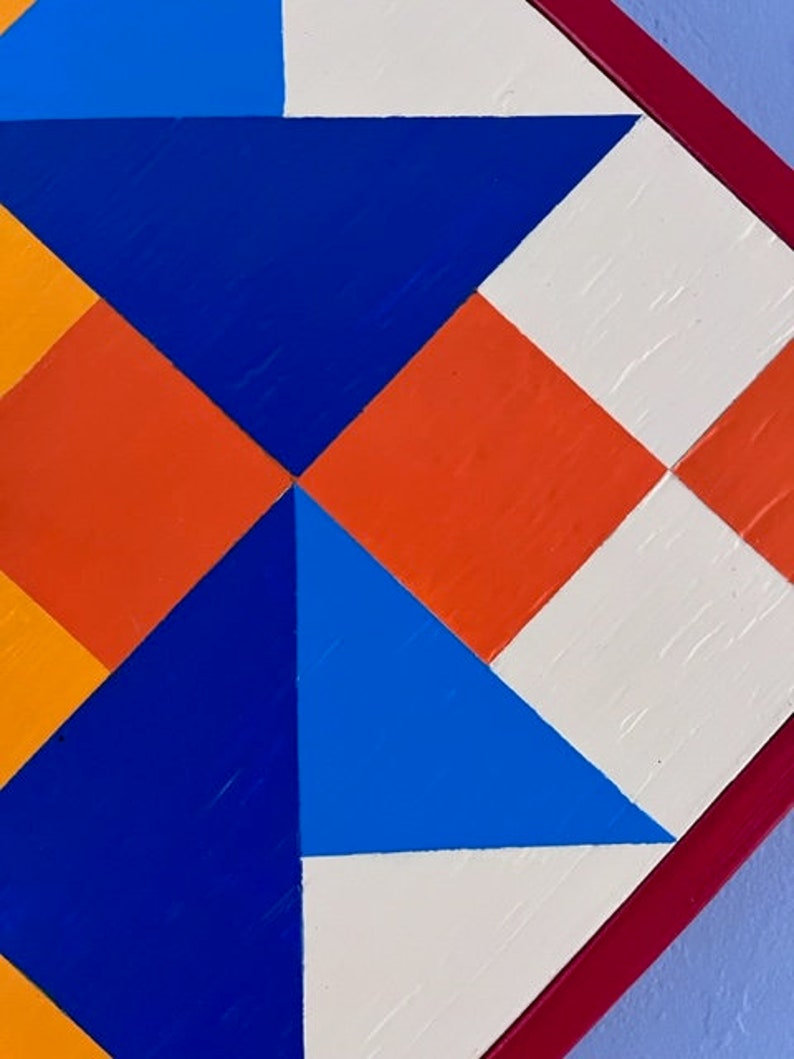 Detail of hand painted Barn Quilt clock.