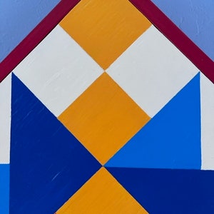 Detail of hand painted Barn Quilt clock.