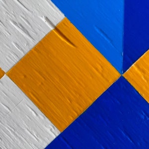 Detail of hand painted Barn Quilt clock.