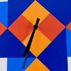 Detail of hand painted Barn Quilt clock.