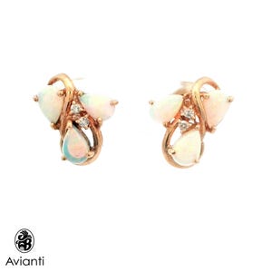 May include: A pair of rose gold stud earrings, each featuring three pear-shaped opals and small clear gemstones. The earrings have a swirling design and are set against a white background. The brand name "Avianti" is visible in the lower left corner.