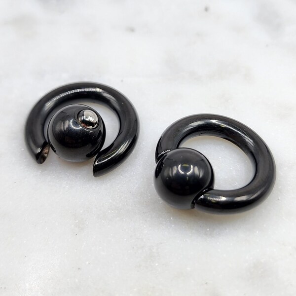 1x 00g 0g 2g 4g 6g 8g 12mm or 16mm Diameter Spring Action Black Plated Captive Ball Large Gauges Surgical Steel Hoop Septum Piercing Plugs