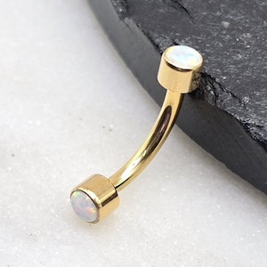 Piercing para ceja con rosca interna y extremos en forma de torre, de titanio, ópalo blanco, grado ASTM F136, con implante PVD dorado y roscas internas