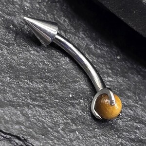 16g Titanium ASTM F136 Spikes & Tiger's Eye Curved Barbell Internally Threaded | Rook Ashley Eyebrow Piercing