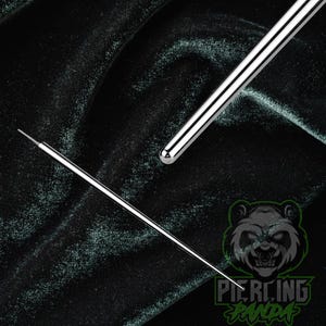 May include: A silver-colored metal piercing taper tool with a smooth, cylindrical body that tapers to a fine, needle-like point. The tool features a rounded end and a long, slender shaft, presented with a logo featuring a panda face and text.