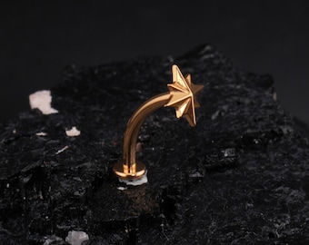 Piercing para ombligo de titanio con base convexa flotante y estrella boreal puntiaguda de PVD dorado, 7 mm, parte superior redonda, rosca interna.