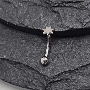 Piercing de titanio Sun Star de 16 g, grado ASTM F136, con barra curva, rosca interna y extremos biselados, para ceja de torre