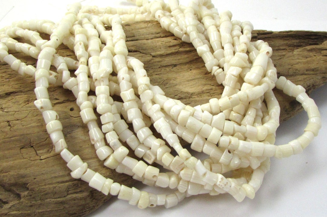 Strand Item Ivory Bamboo Coral Beads, 16