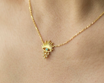 Boze oog-ketting / 14 kt massief goud