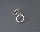 Silver geometric studs, open circle stud earrings, minimalist silver studs, silver circle earrings, karma stud earrings