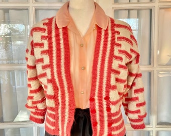 1950s cropped pinup style cardigan. Salmon color. Lined. Xs to small.