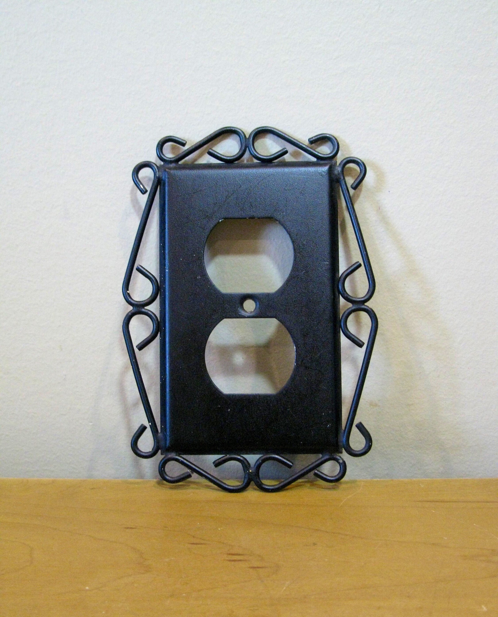 Vintage metal outlet cover 1960s black swirls decorative Etsy
