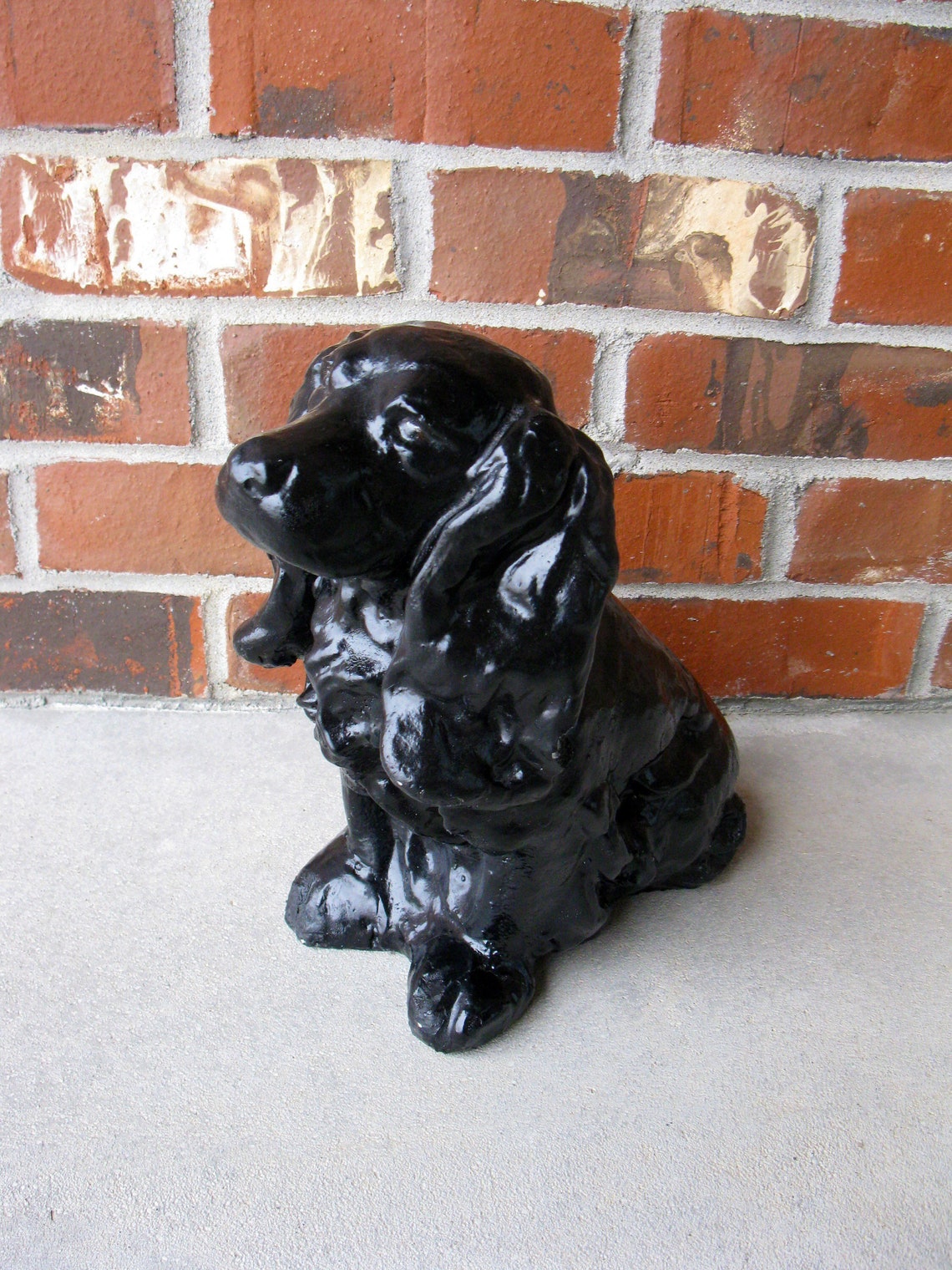 concrete spaniel statue