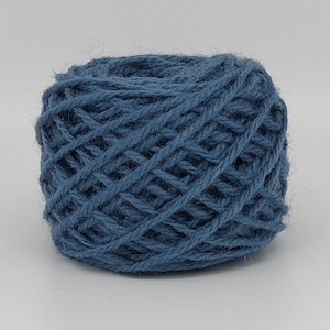 May include: A ball of blue yarn, ready for knitting or crocheting.