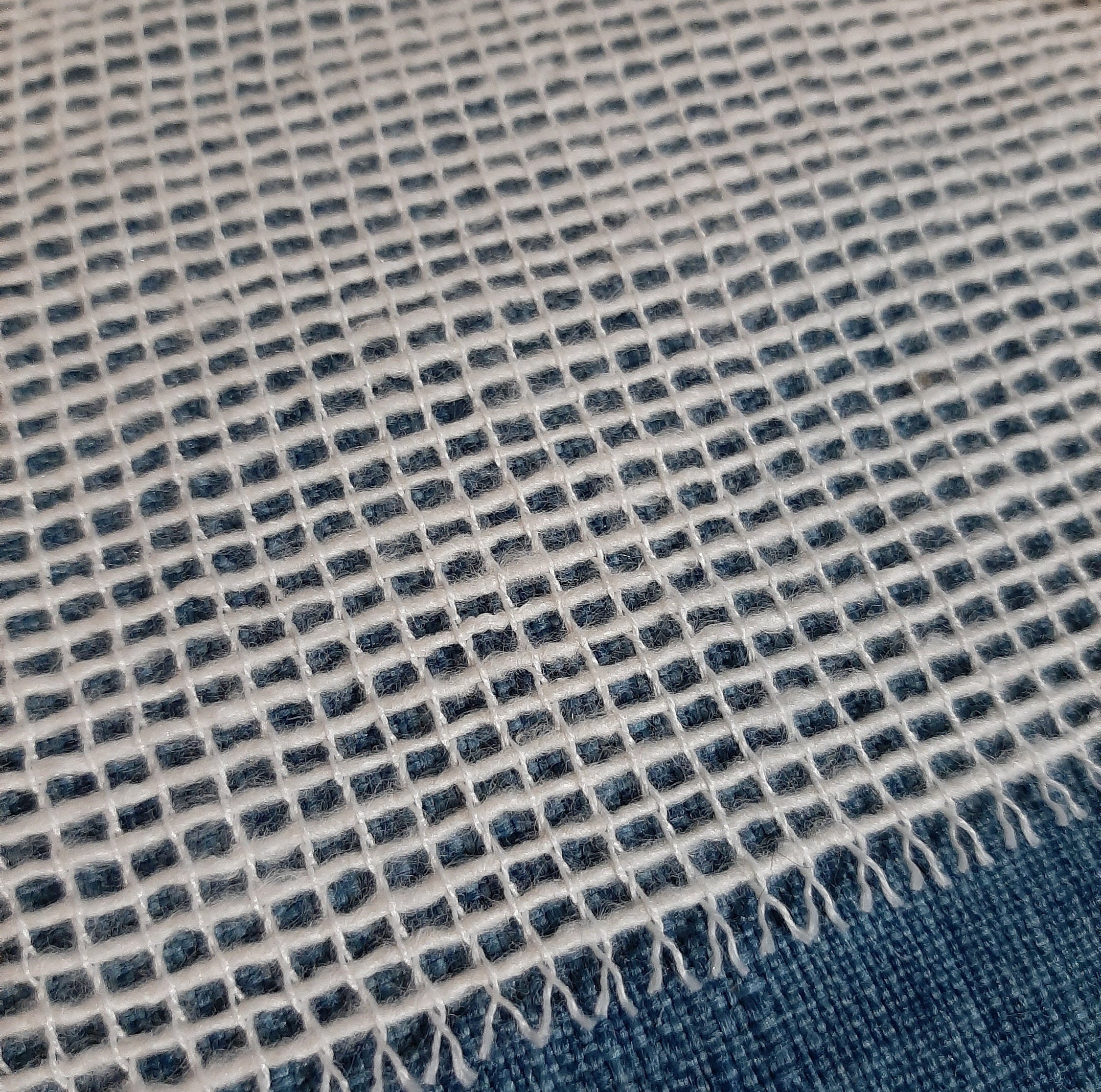 Secondary Backing Material for Finishing Tufted or Hooked Rugs
